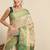 Green beige tissue woven zari work saree with blouse