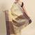 Beige blue tissue woven zari work saree with blouse