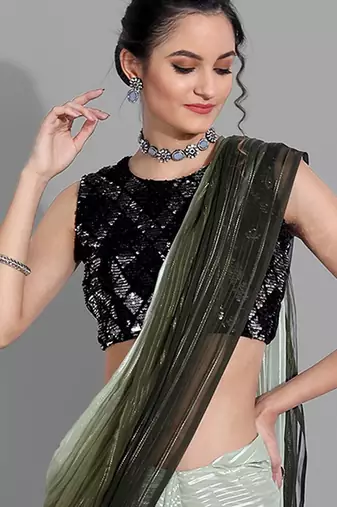 Dark green georgette woven zari work saree with blouse