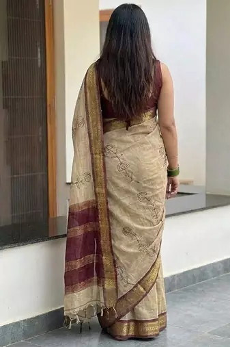 Beige blended cotton embroidered zari work saree with blouse
