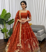 Rust silk blend thread embroidered  Lehenga & Unstitched Blouse with Dupatta