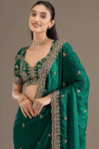 Green sequin embroidered, cut work satin silk bollywood saree with blouse