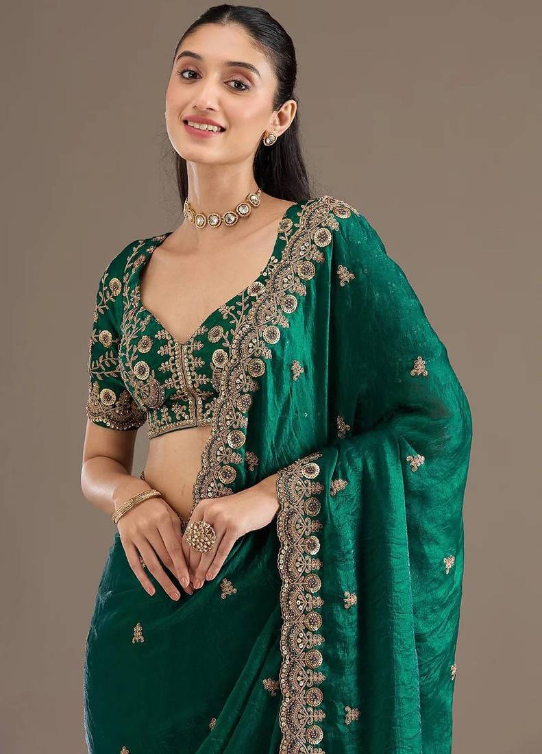 Green sequin embroidered, cut work satin silk bollywood saree with blouse