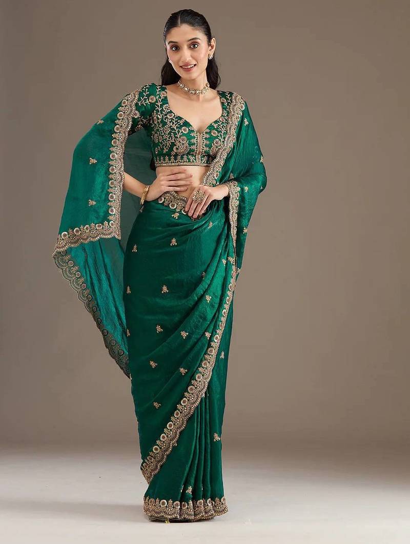 Green sequin embroidered, cut work satin silk bollywood saree with blouse