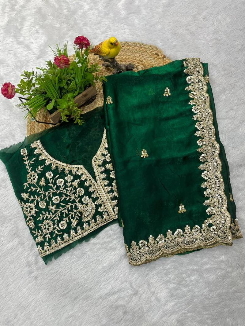 Green sequin embroidered, cut work satin silk bollywood saree with blouse