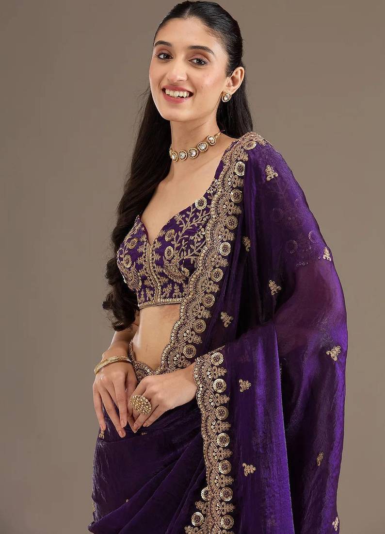 Purple sequin embroidered, cut work satin silk bollywood saree with blouse