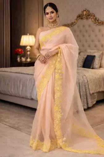peach emboidered cut work organza saree with blouse