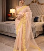 peach emboidered cut work organza saree with blouse