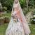 Ivory Embroidered Rambagh Silk Lehenga Set With Veil