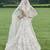Ivory Embroidered Tulle Lehenga Set With Veil