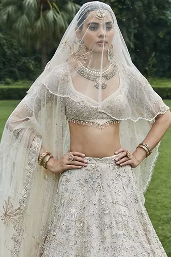 Ivory Embroidered Tulle Lehenga Set With Veil