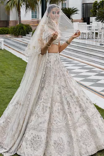 Ivory Embroidered Tulle Lehenga Set With Veil