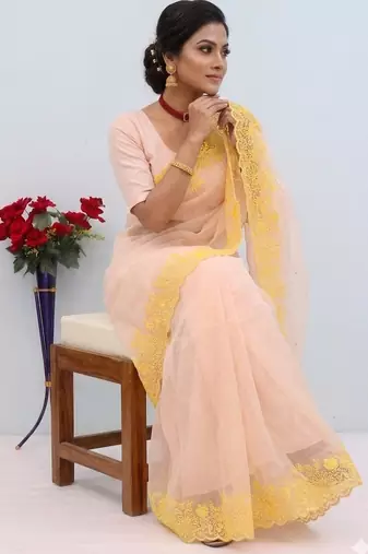 peach emboidered cut work organza saree with blouse