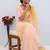 peach emboidered cut work organza saree with blouse