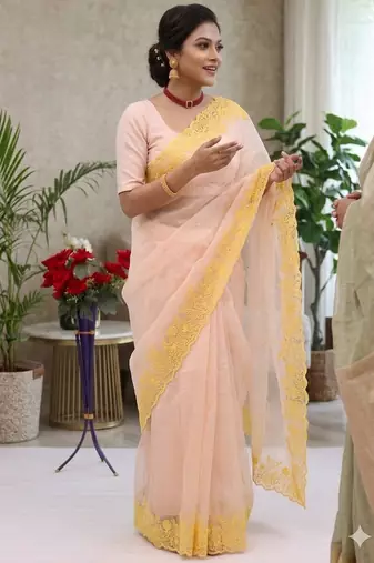 peach emboidered cut work organza saree with blouse