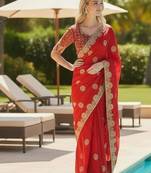 Red embroidered, cut work satin silk bollywood saree with blouse
