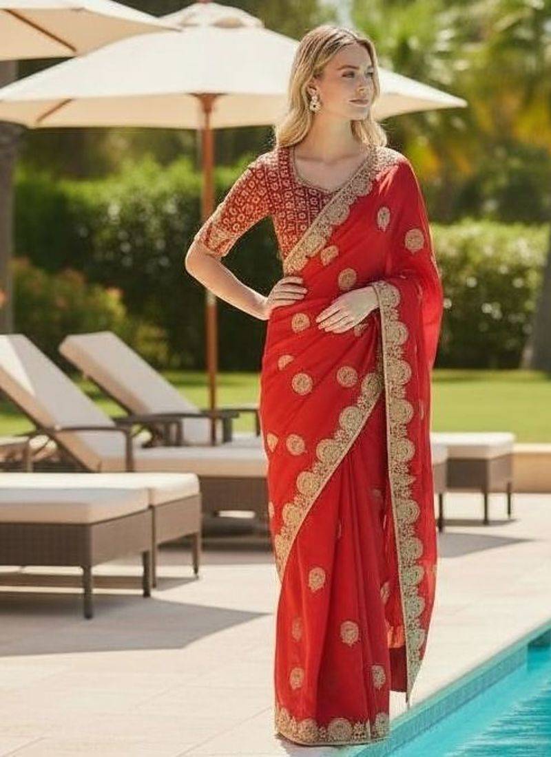 Red embroidered, cut work satin silk bollywood saree with blouse