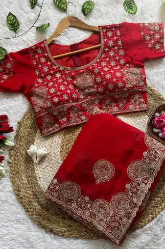 Red embroidered, cut work satin silk bollywood saree with blouse