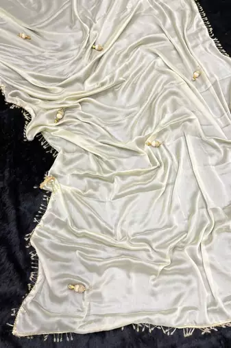 Off white hand made lace with latkan rangoli silk bollywood saree with blouse