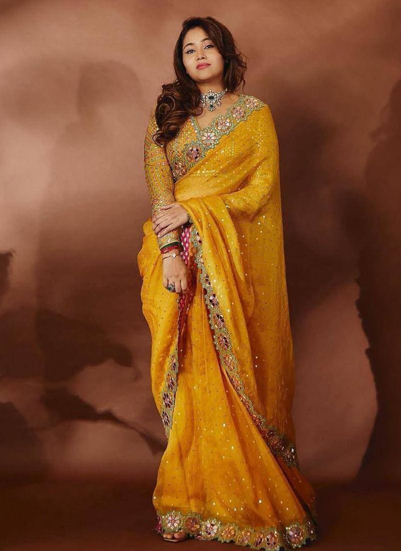 yellow sequin embroidered mirror work georgette saree with blouse