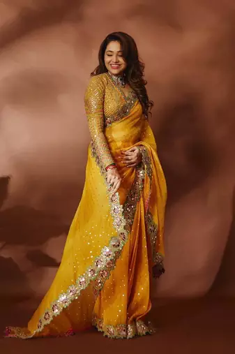 yellow sequin embroidered mirror work georgette saree with blouse