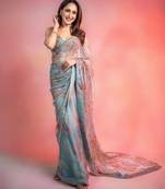 sky blue printed sequin embroidered georgette saree with blouse