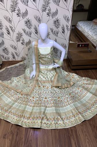 Pure Silk Party Wear Lehenga In Light Green Color Color With Embroidery Work