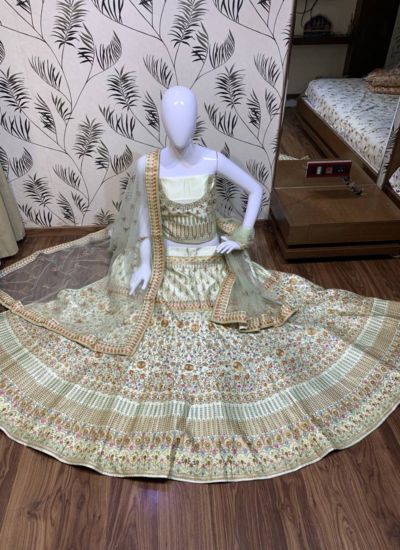 Pure Silk Party Wear Lehenga In Light Green Color Color With Embroidery Work