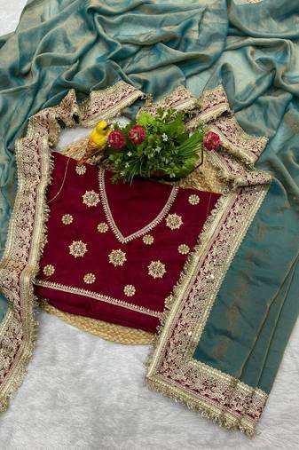 Teal blue embroidered mocha silk bollywood saree with blouse