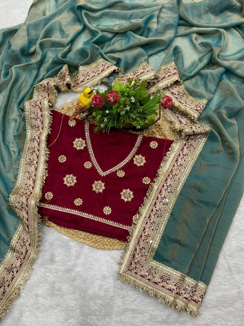 Teal blue embroidered mocha silk bollywood saree with blouse