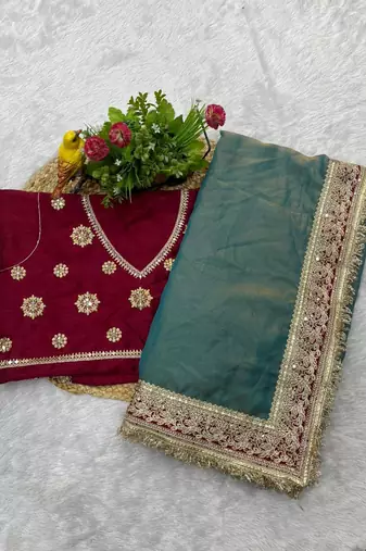 Teal blue embroidered mocha silk bollywood saree with blouse