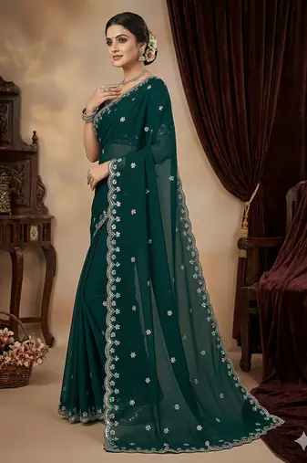 Teal green heavy embroidered real moti with sequin embroidered zimmy choo silk saree with blouse