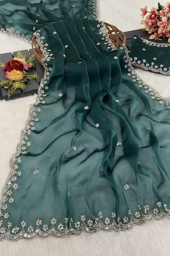 Teal green heavy embroidered real moti with sequin embroidered zimmy choo silk saree with blouse