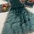 Teal green heavy embroidered real moti with sequin embroidered zimmy choo silk saree with blouse