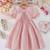 Peach embellished textured fabric bow style girls dress