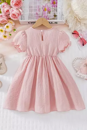 Peach embellished textured fabric bow style girls dress