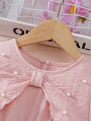 Peach embellished textured fabric bow style girls dress 3
