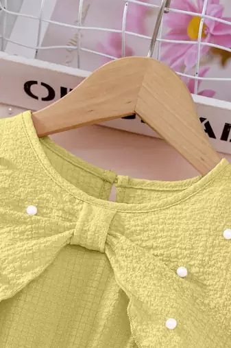 Yellow embellished textured fabric bow style girls dress