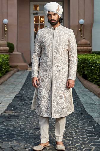 Golden ivory embroidered rambagh silk sherwani set