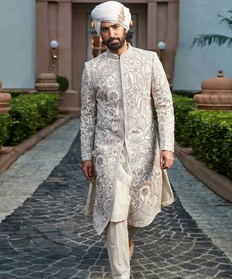 Golden ivory embroidered rambagh silk sherwani set 3