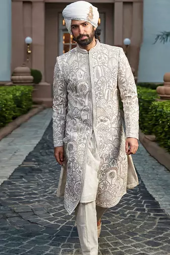 Golden ivory embroidered rambagh silk sherwani set