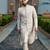 Golden ivory embroidered rambagh silk sherwani set