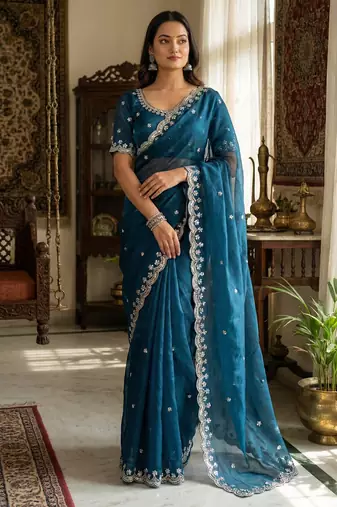 Teal blue heavy embroidered real moti with sequin embroidered zimmy choo silk bollywood saree with blouse
