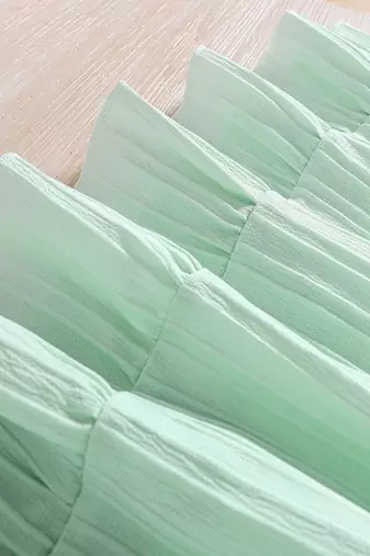 Mint green solid textured cotton sleeveless fit & flare kids dress