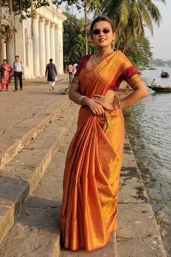  orange glow orange handloom tissue saree