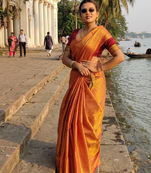  orange glow orange handloom tissue saree