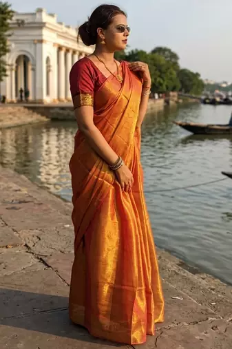  orange glow orange handloom tissue saree