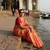  orange glow orange handloom tissue saree