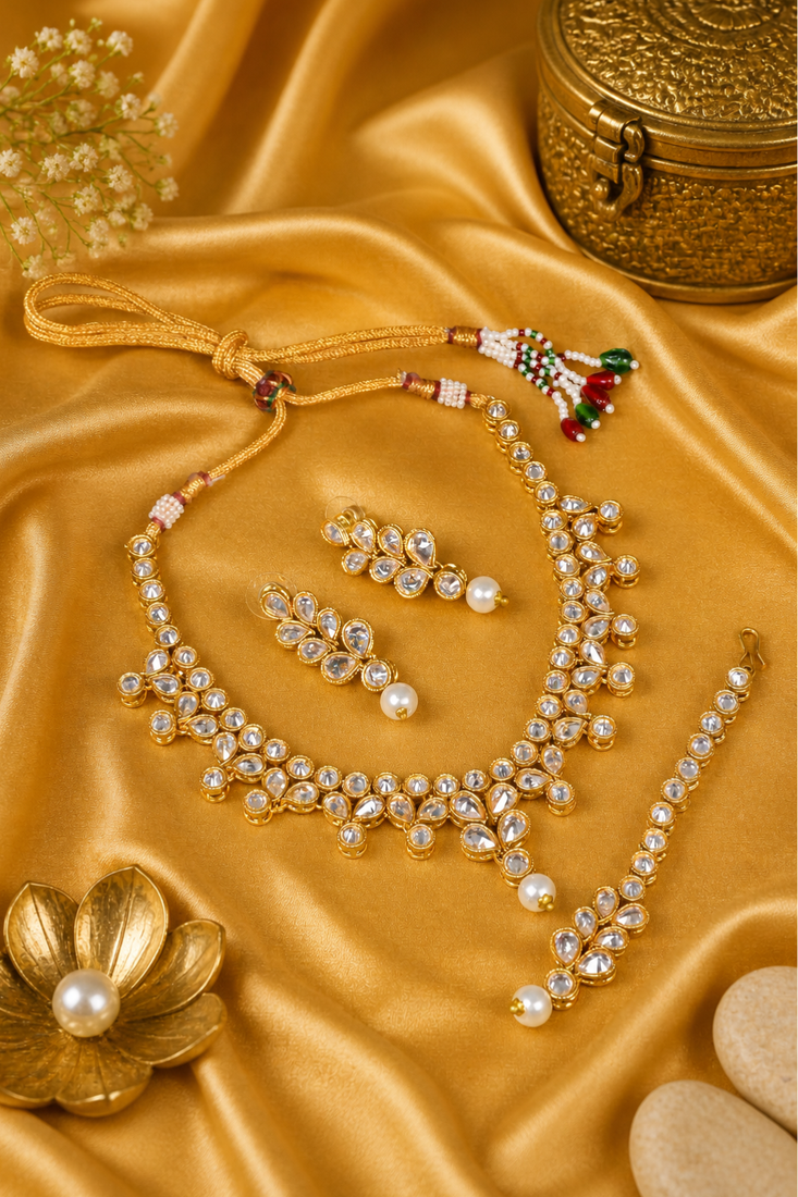 Gold plated white kundan embellished necklace set
