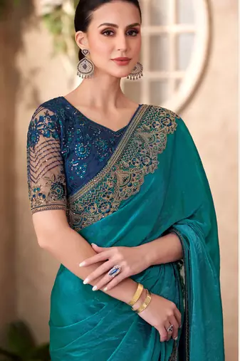 Teal satin georgette embroidered saree with unstitched blouse piece